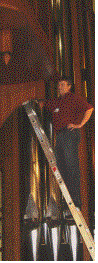 Text Box:  
Figure 1Gary Dodd prepares to inspect the upper works of the Martin Ott organ.

